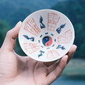 Taza «Cinco Tali‑smanes del Trueno» con Bagua — cada patrón nutre la mente